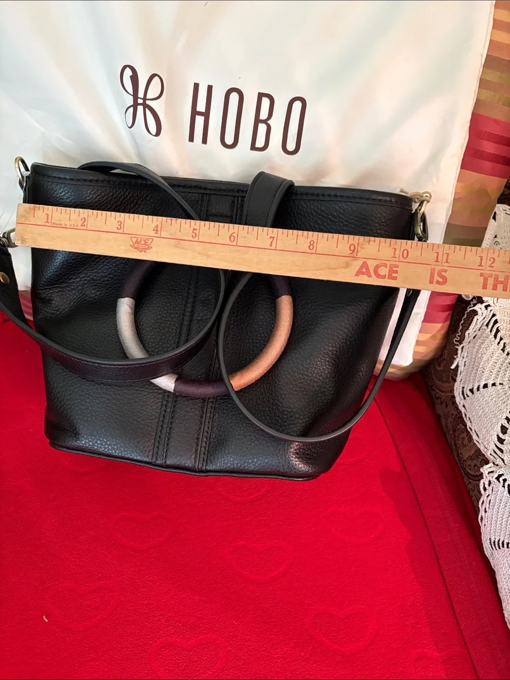 HOBO Black Pebbled Leather Hobo with Multicolor Ring Accent